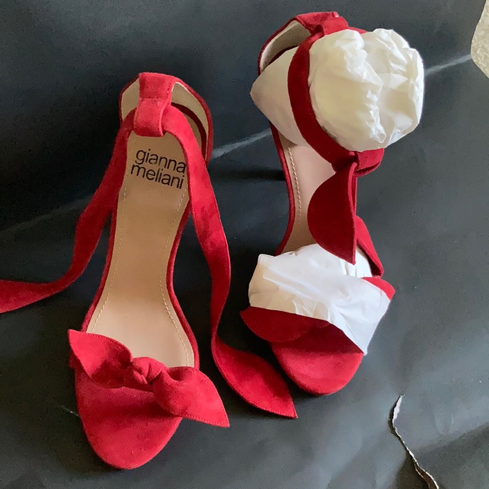 Red soft leather, never worn. Sexy!